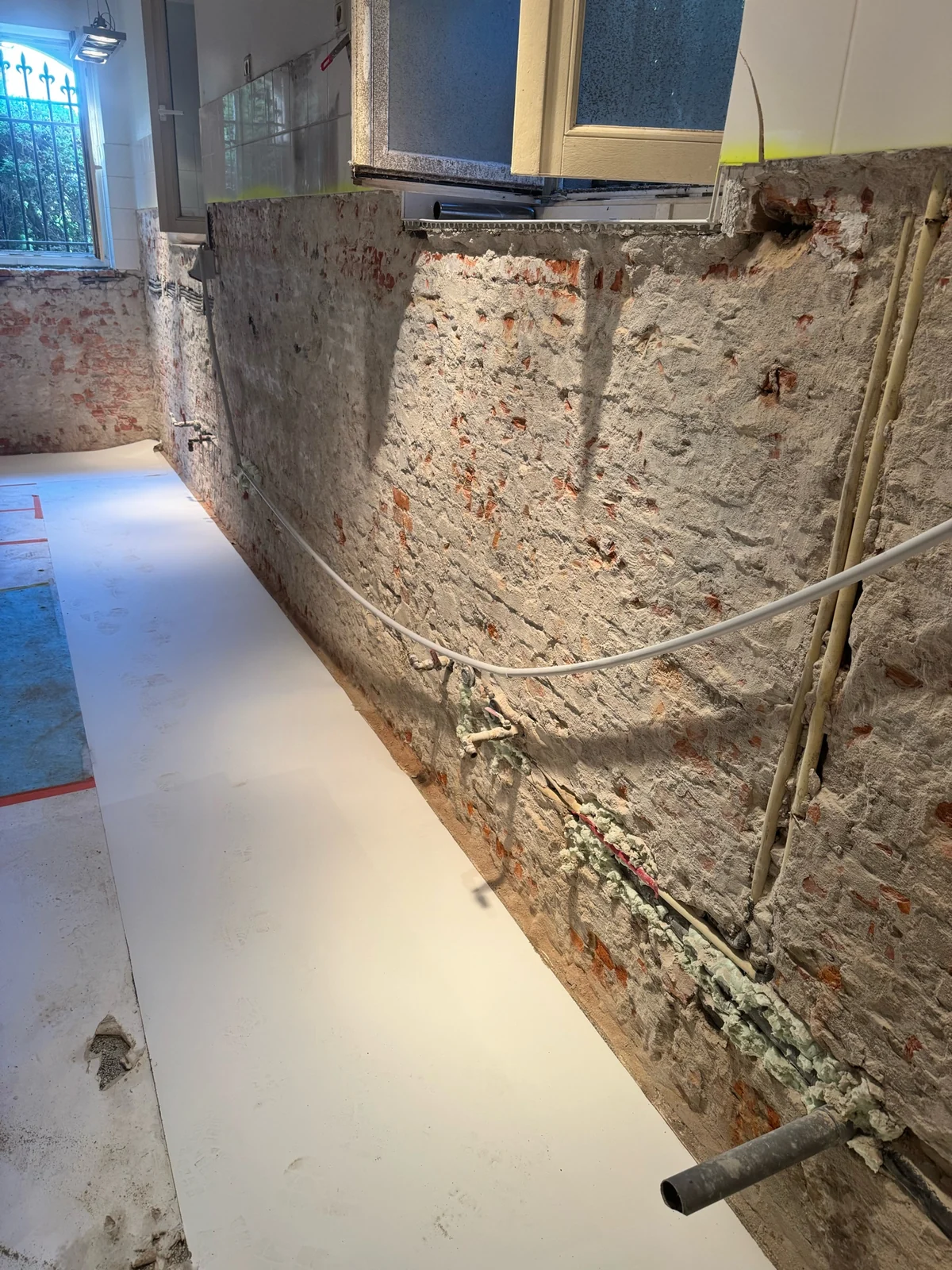 Kelderwand in de geregistreerde werkzone van de Brusselse projectcase